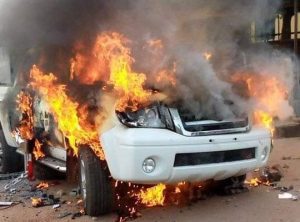 image of police car burning